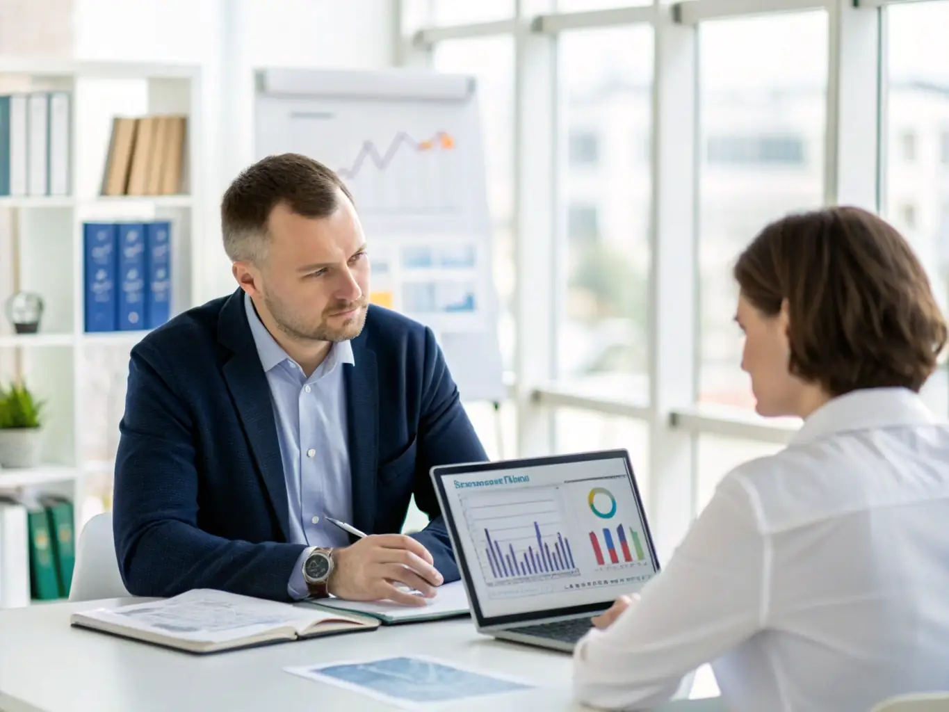 A sophisticated, modern office interior with financial advisors consulting with clients, emphasizing trust and expertise in wealth management.